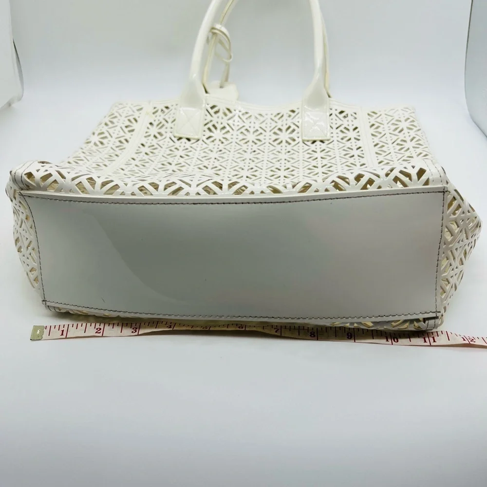 Tory Burch white geometric laser cut out tote bag